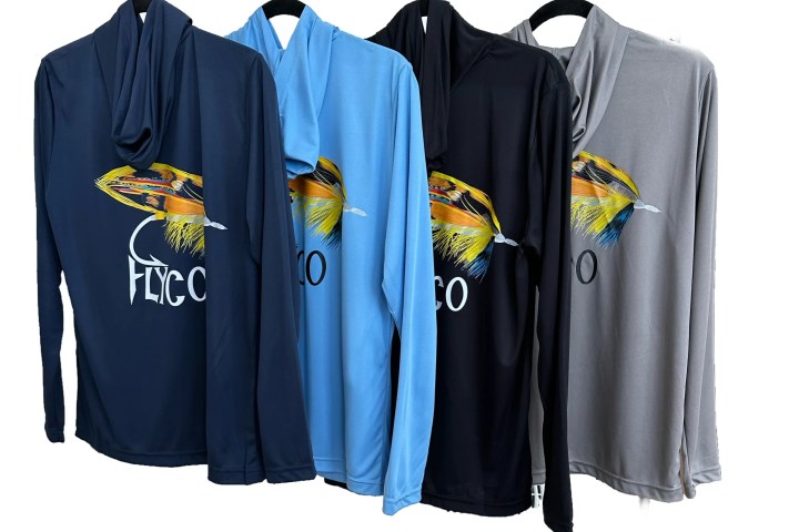 Four hoodies in navy, light blue, black, and gray with a colorful fly fishing lure design.