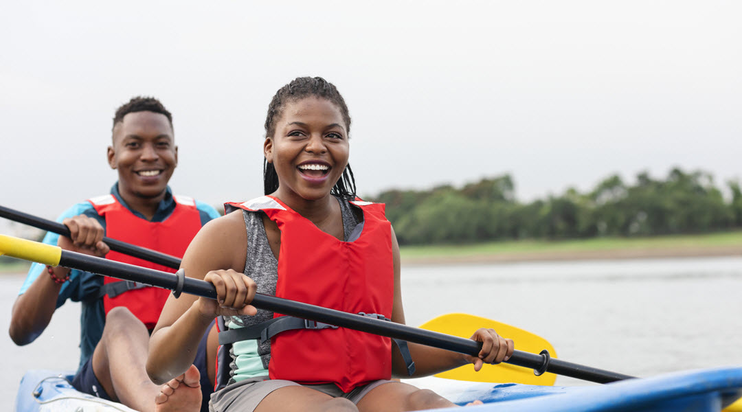 Couple Wearing Life Jacket