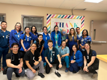 a group of people posing for a photo