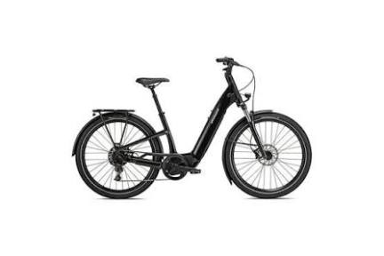 Black electric bicycle with step-through frame and rear rack.