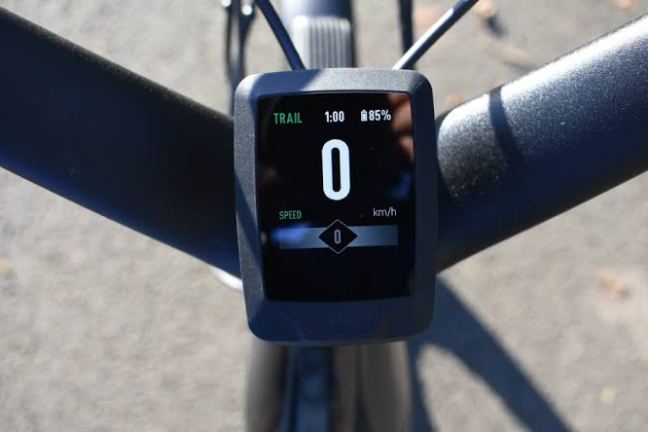 Bicycle handlebar with a digital speedometer showing 0 km/h.